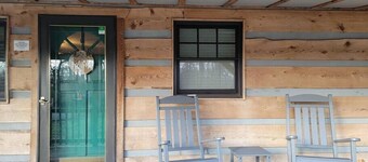 Cozy cabin inviting you to "Just Breathe"