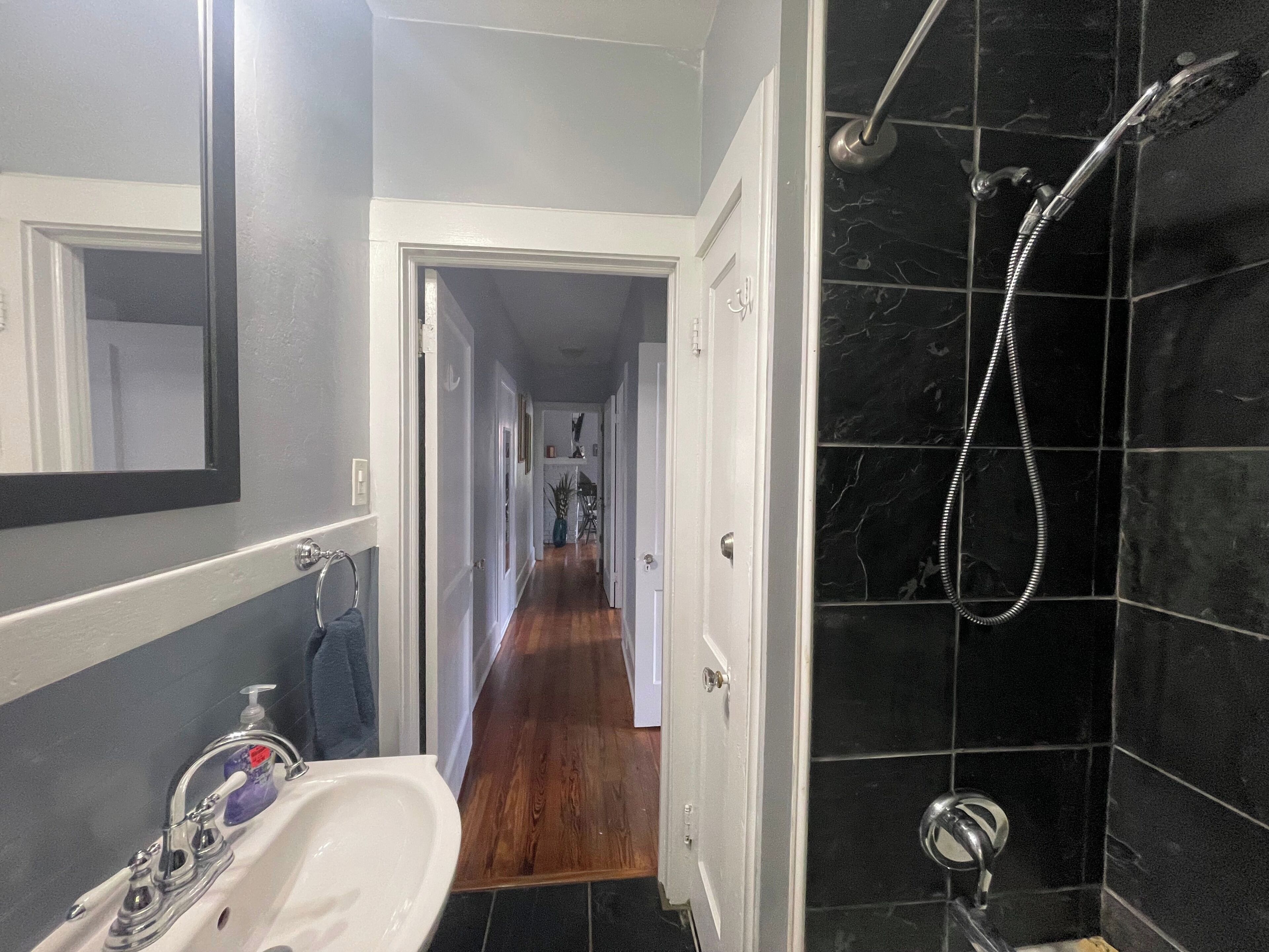 Combined shower/tub, hair dryer, towels, soap