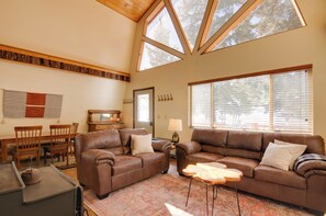 TV, fireplace, books - Unique Forest Cabin with Deck: Ski, Hike, Fish! (Duck Creek Village)