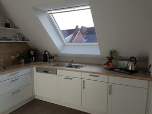 Fridge, microwave, oven, stovetop - Sielresidenz - 85sqm vacation apartment for 4 people with fireplace, heated cabin & balcony (Krummhörn)