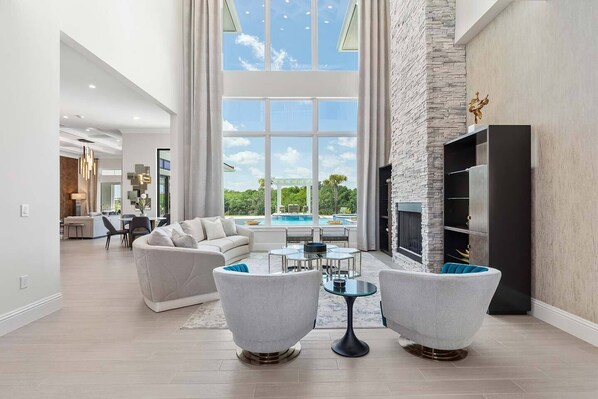 TV, fireplace, table football, ping pong - Luxurious Oasis with Immersive Circus Bedroom at Reunion (Kissimmee)