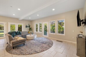 Smart TV, DVD player, table football, books