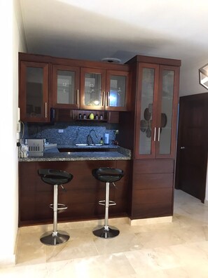 Fridge, microwave, oven, cookware/dishes/utensils