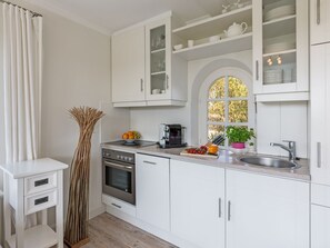 Fridge, oven, dishwasher, coffee/tea maker