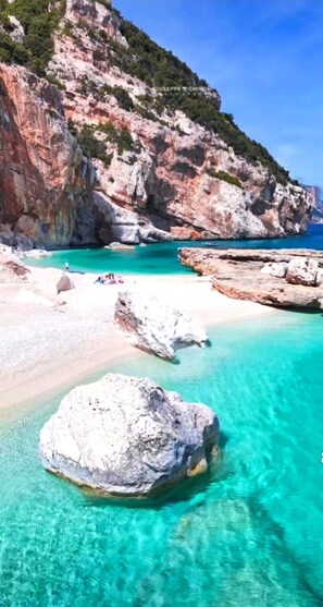 On the beach, sun loungers