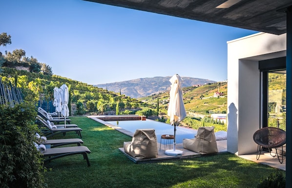 Seasonal outdoor pool, pool umbrellas, sun loungers