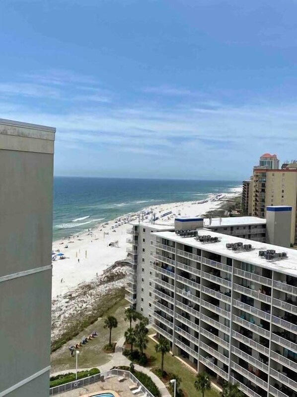 A high-rise hotel with a view of the beach and ocean. - Beachfront Condo with Spectacular Views and Heated Pool! (Orange Beach)