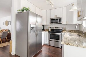 Fridge, microwave, oven, stovetop - NEW! Cozy and bright 3-bedroom getaway (Minutes from downtown) (Denver)