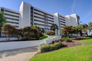 Guests can enjoy balconies and a serene landscaped area surrounding this hotel.