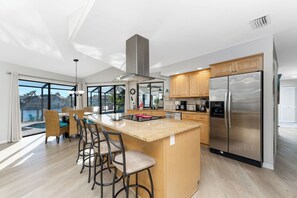 Fridge, microwave, oven, stovetop - Southern Exposure-Sun ALL Day! Lanai, Heated Pool, Waterfront, Dock Area & BBQ! (Cape Coral)