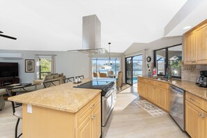 Fridge, microwave, oven, stovetop - Southern Exposure-Sun ALL Day! Lanai, Heated Pool, Waterfront, Dock Area & BBQ! (Cape Coral)