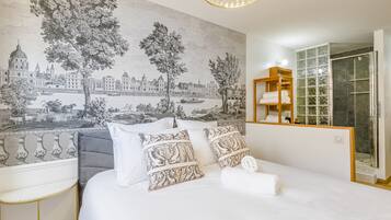 1 bedroom, desk, iron/ironing board, travel crib