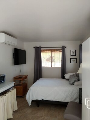 1 bedroom, desk, blackout curtains, iron/ironing board