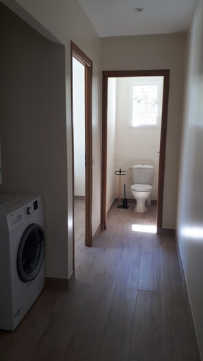 Shower, hair dryer, towels, toilet paper