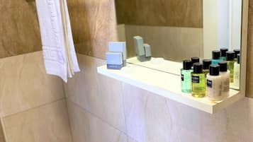 Shower, rainfall showerhead, towels, soap