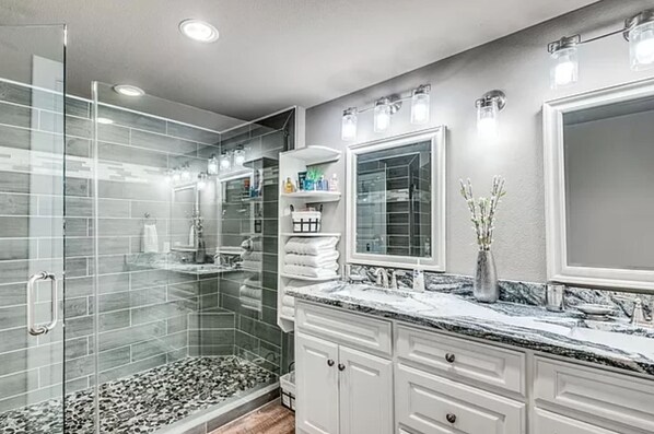 Shower, hair dryer, towels, soap