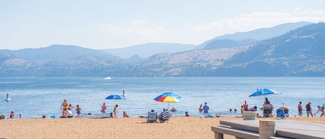 On the beach, sun-loungers