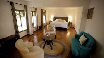 Deluxe Room, 1 King Bed | Premium bedding, down comforters, in-room safe, individually decorated