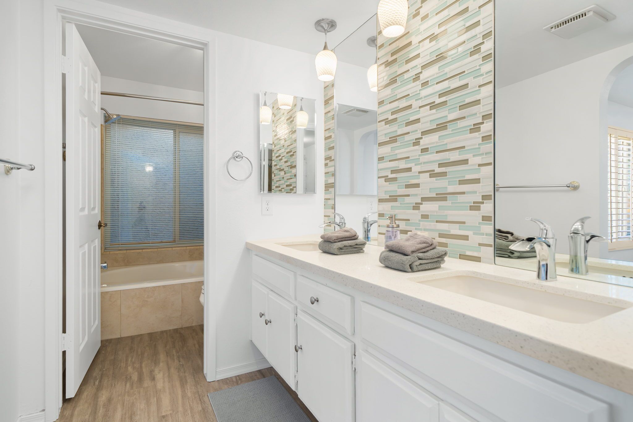 Combined shower/tub, hair dryer, towels, soap