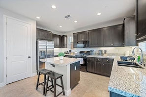 Fridge, microwave, oven, stovetop - LuxoStays| ! Spacious, Cozy and Peaceful 5BR House (Pittsburg)