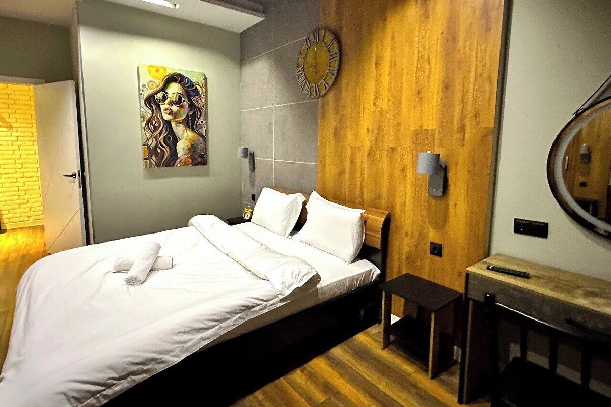 Family Apartment, Air conditioning, City View | Minibar, blackout drapes, WiFi (free), individually decorated