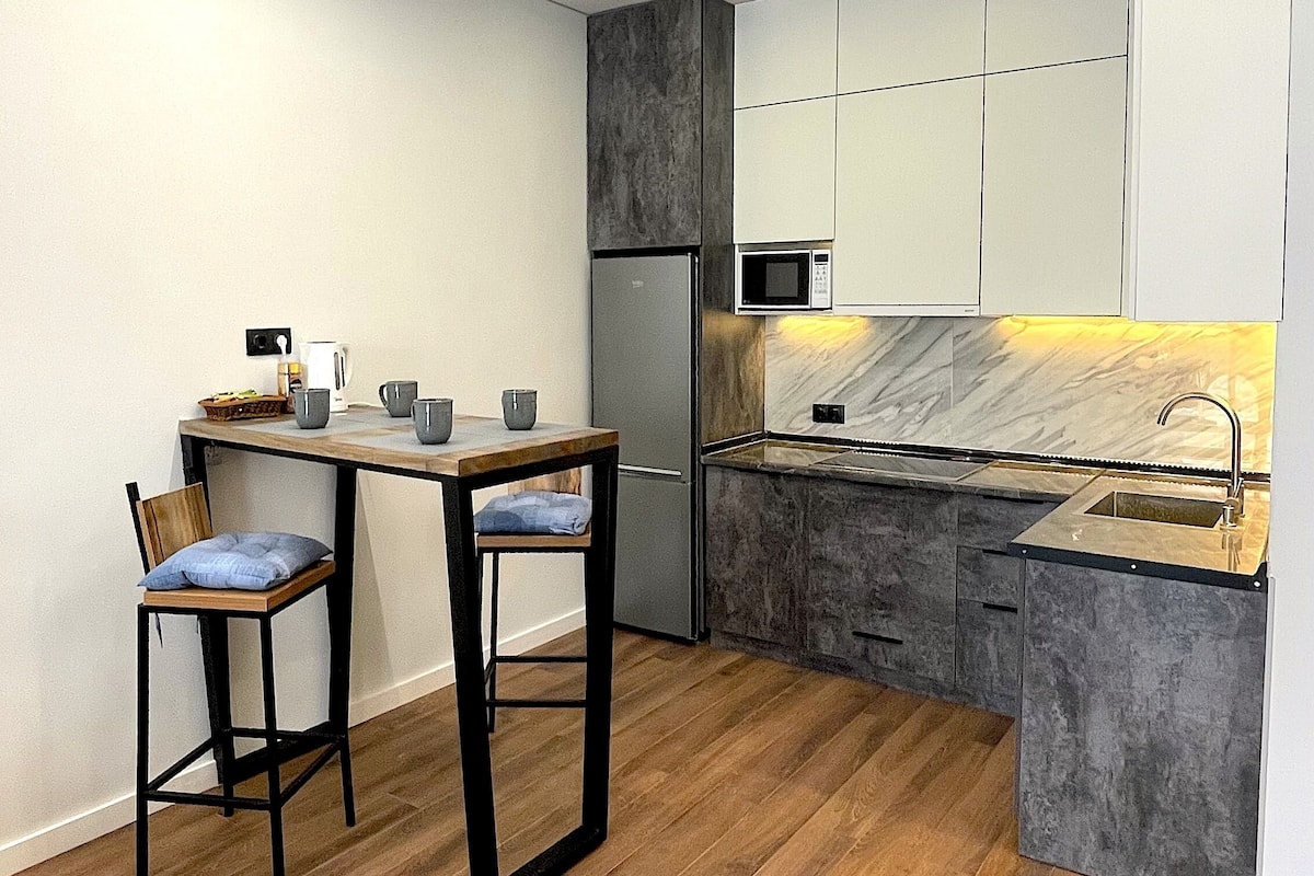 Design Studio, Refrigerator & Microwave | Private kitchen