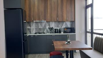 Comfort Apartment | Private kitchen | Mini-fridge, microwave, stovetop, espresso maker