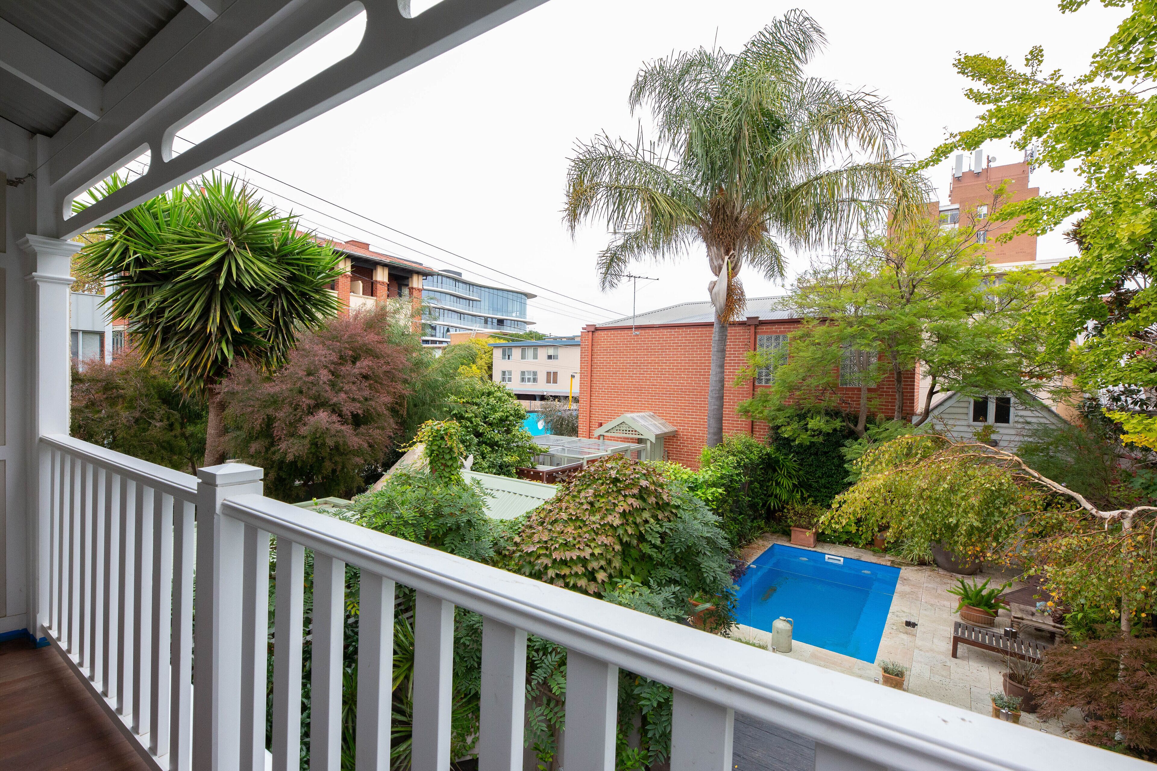 Heritage terrace house with oasis pool garden by the beach — image 16