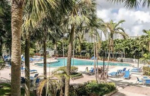 Outdoor pool, a heated pool - Spacious and bright 3BR+2BA+free parking included, just in front of beach (Sunny Isles Beach)