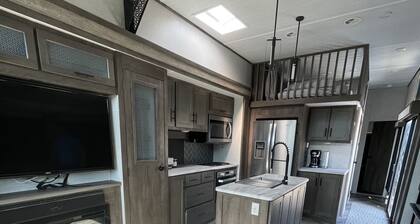 Bayview RV/Camper with private boat dock looking over sunset