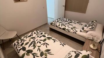 3 slaapkamers, een strijkplank/strijkijzer, wifi, beddengoed