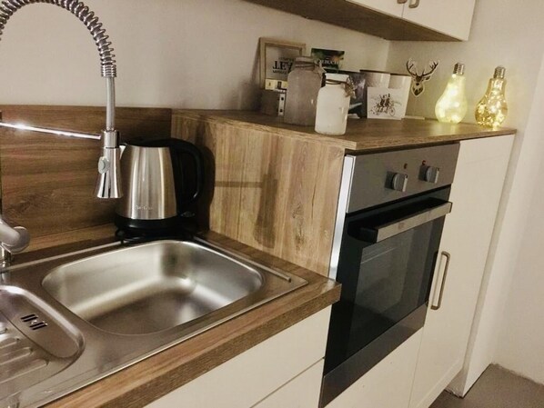 Refrigerador, horno, placa de cocina, lavavajillas
