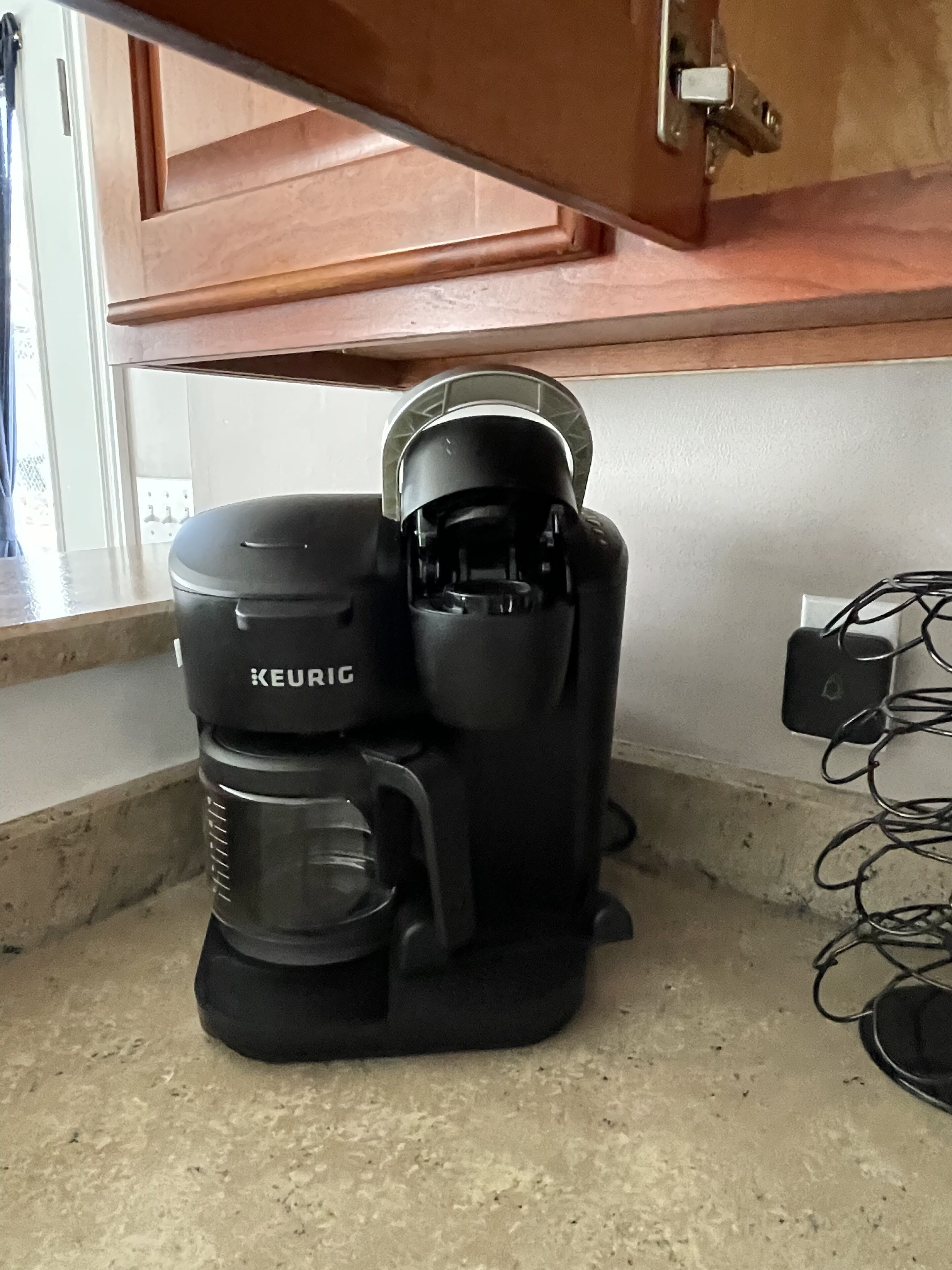 A Keurig coffee maker on a kitchen counter.