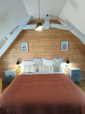 2 dormitorios, tabla de planchar con plancha, cuna de viaje