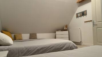 4 bedrooms, desk, iron/ironing board, travel cot