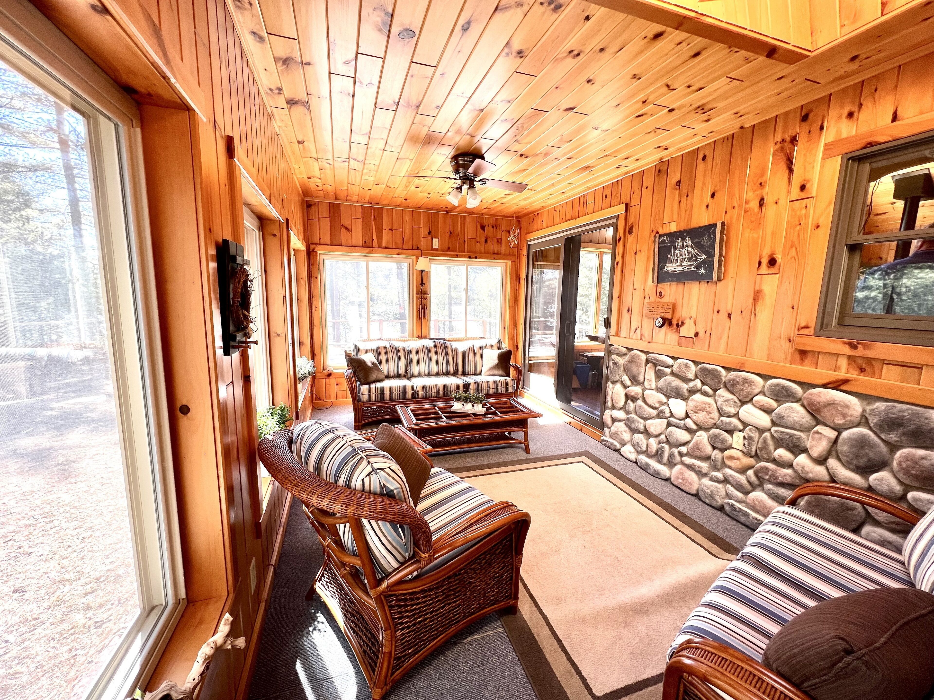 Family friendly lakefront cabin with 140 ft of clear, sandy frontage.