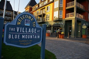 A sign welcoming visitors to The Village at Blue Mountain, established in 2001. - Walking distance to village! HOT TUB & SAUNA (Blue mountain)