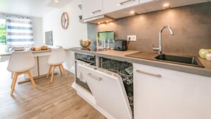 Coffee/tea maker, fridge, microwave, stovetop - Cozy home in Damp with sauna (Damp)