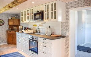 Fridge, stovetop, coffee/tea maker