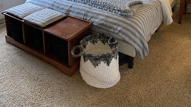 A bedroom with a large bed, a chandelier, a wall painting, and a window with curtains. - World Track Championships-3 Bedroom Home. Car available. (Eugene)