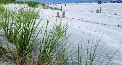 Steps to Beautiful Brigantine Beach.
1st. Floor Unit with Private Porch.