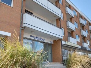 A multi-story building with a sign reading "Haas Northland" and the address "19-21".
