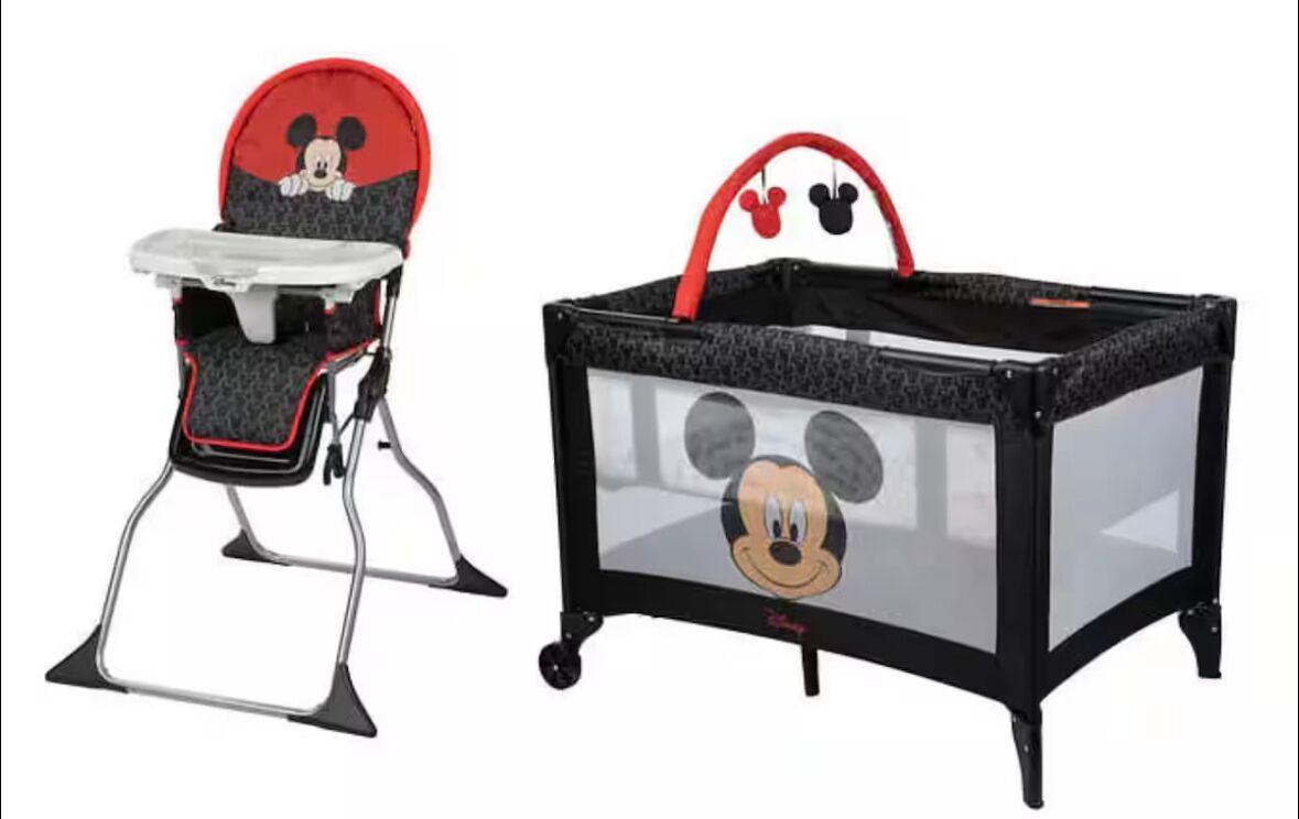 A high chair with a Mickey Mouse design and a storage bin with a Mickey Mouse window.