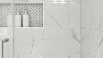 Bathtub, hair dryer, towels, soap
