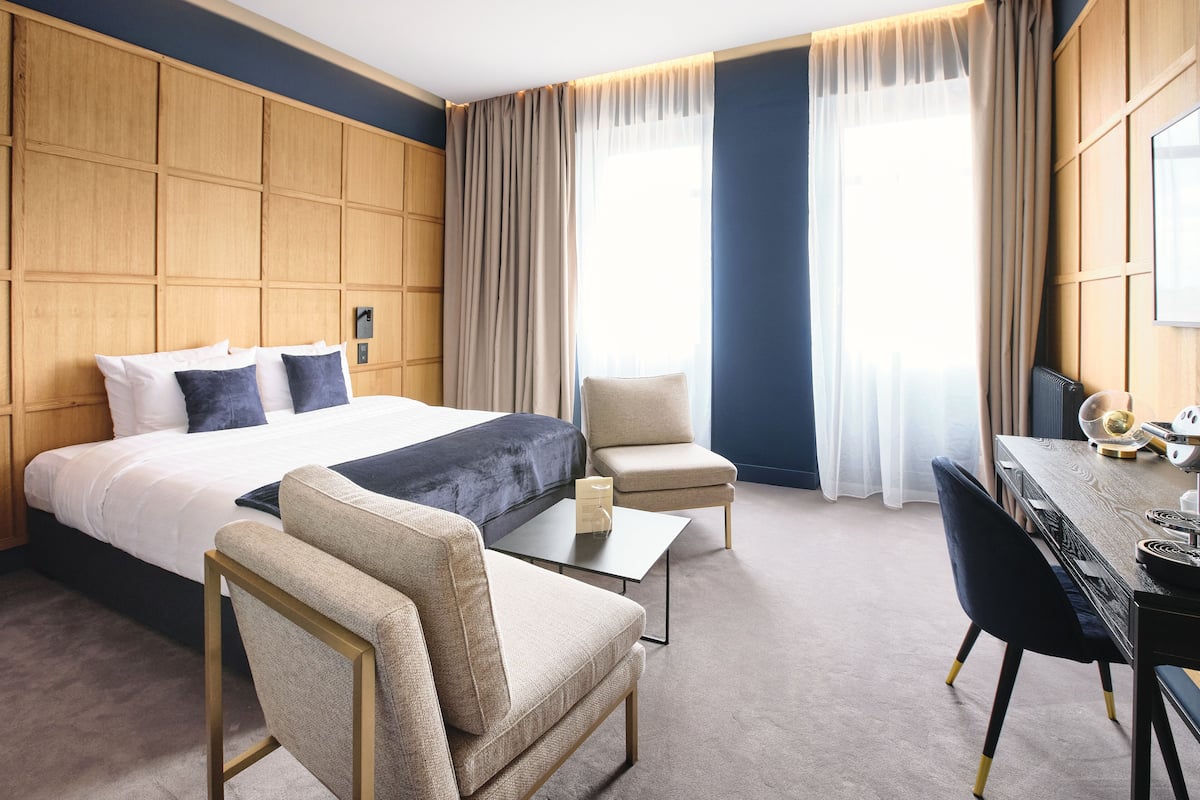 Deluxe Room | Pillow-top beds, free minibar, in-room safe, individually decorated