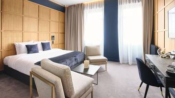 Deluxe Room | Pillowtop beds, free minibar, in-room safe, individually decorated