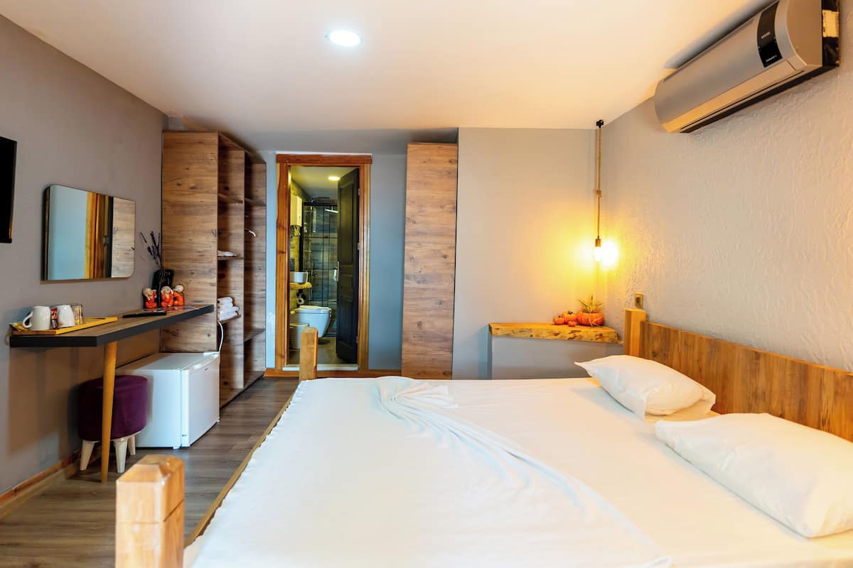 Kamar Triple Standar, pemandangan laut | Seprai premium, minibar, dan didekorasi berbeda-beda
