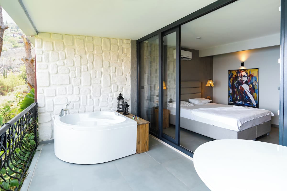 Kamar Romantis, bathtub, pemandangan laut | Seprai premium, minibar, dan didekorasi berbeda-beda