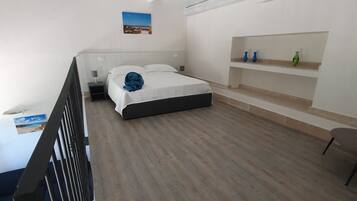 Deluxe Room | Premium bedding, down duvets, in-room safe, blackout curtains