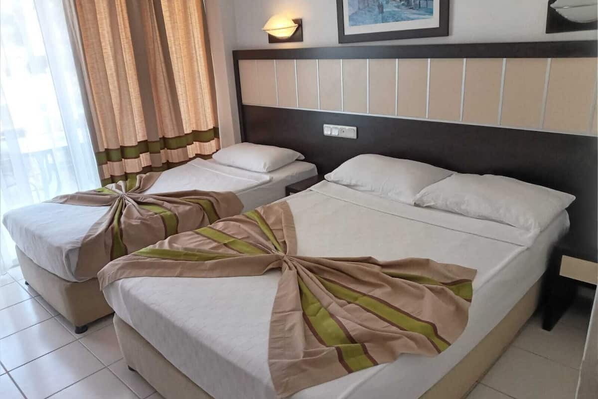 In-room safe, WiFi (surcharge), bed sheets